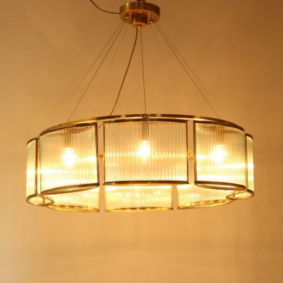 Stilio Ring pendant lamp in brass Licht im Raum 6 bulbs side view