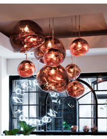 Melt pendant lamp Tom Dixon copper color in dining room