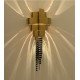 Guggenheim Wall Lamp Luxxu gold color in dining room